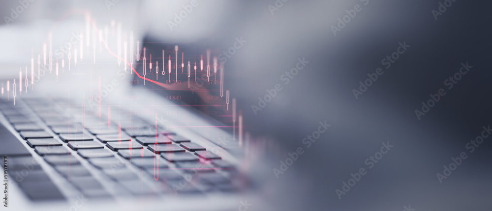 Poster close up of laptop keyboard with falling crisis financial forex chart on blurry wide background with