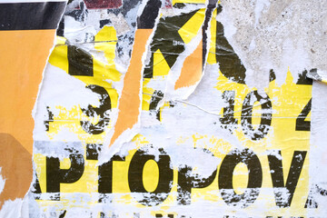 Fototapeta premium Torn street poster background, messy old paper collage