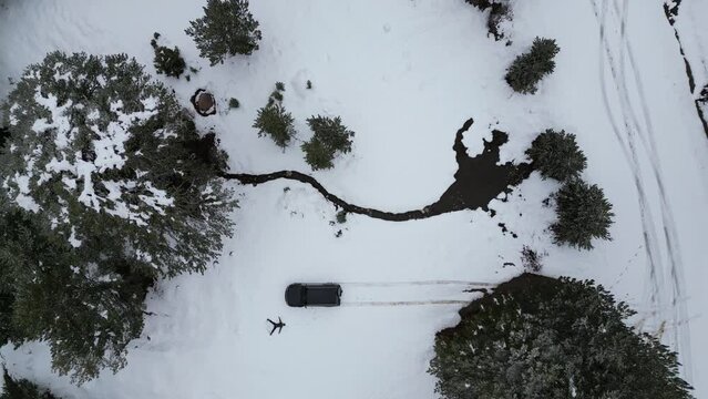 adventurous man living in mountains in harsh nature conditions