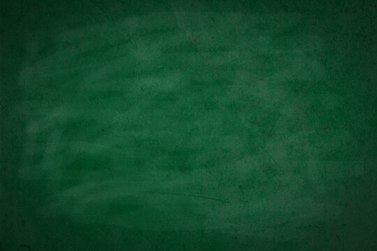 Green board. Dark green wall backdrop. Education concepts.