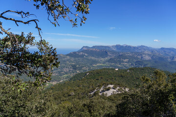 Fototapeta na wymiar view of the tramuntana mountain range and the hermitage of Maristela, Son Ferra, Esporles, Majorca, Balearic Islands, Spain