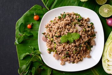 Local Thai food, Spicy minced pork salad (Larb Moo), Table top view