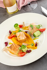 Smoked salmon on stone table in fine dining restaurant