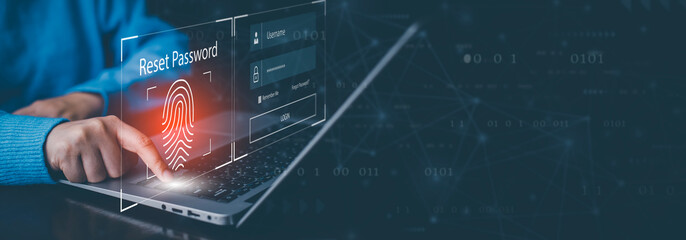 cyber security and reset password login online concept  Hands typing and entering username and...