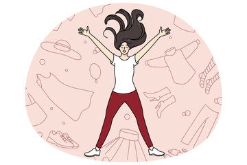 Overjoyed young girl lying among clothes excited with shopping and purchase. Smiling woman shopaholic with garment and apparel. Concept of consumerism and fast fashion. Vector illustration.