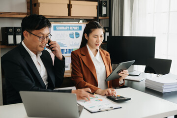 Portrait of success business people working together in home office. Couple teamwork startup concept