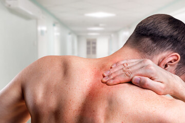 Pain in the cervical spine. Symptom of cervical chondrosis. Inflammation of the vertebrae in a man....