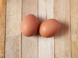 fresh farm eggs on wooden background