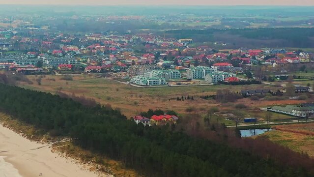 Aerial view looking over Grzybowo near Kołobrzeg in Poland from the Baltic Sea