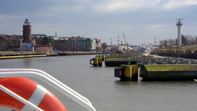 POV of the entrance of a pleasure boat in the docks of the Polish city of Kołobrzeg