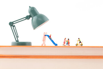Miniature scene under the light of children's education books