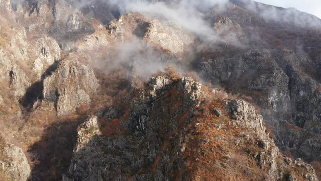 Flying Above Rocky Hills on Slopes of Italian Alps in Autumn Season, Drone Shot