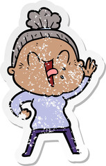 distressed sticker of a cartoon happy old woman