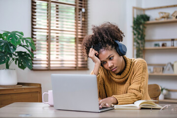 Young teenager asian woman prepare learning study listen from online class video call zoom google...
