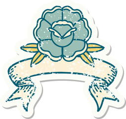 worn old sticker with banner of a flower