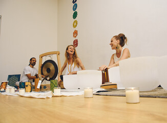 master of a meditation ceremony playing instruments