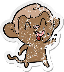 distressed sticker of a crazy cartoon monkey
