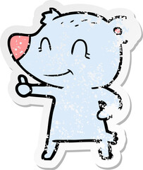 distressed sticker of a cartoon bear giving thumbs up sign