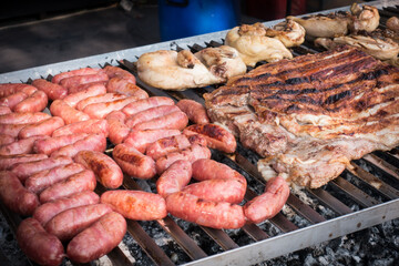 Various meats cooked on the grill. Barbecue.