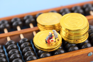 Miniature World Elderly Gold Coins and Abacus