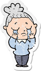 distressed sticker of a cartoon crying woman