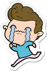 sticker of a cartoon man crying