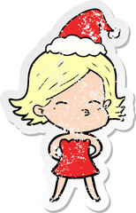 hand drawn distressed sticker cartoon of a woman wearing santa hat