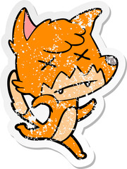 distressed sticker of a cartoon cross eyed fox