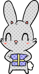 cute cartoon rabbit with present