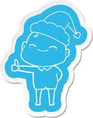 happy quirky cartoon  sticker of a bald man wearing santa hat