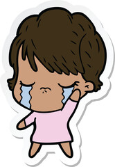 sticker of a cartoon woman crying