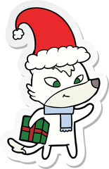 sticker of a friendly cartoon christmas wolf