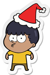 hand drawn sticker cartoon of a curious boy wearing santa hat