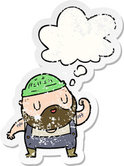 Fototapeta premium cartoon dock worker with thought bubble as a distressed worn sticker
