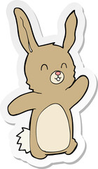 sticker of a cartoon happy rabbit