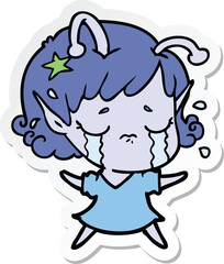 sticker of a cartoon crying alien girl