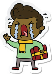 sticker of a cartoon crying man