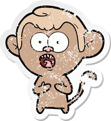 distressed sticker of a cartoon shocked monkey