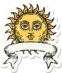 worn old sticker with banner of a sun with face