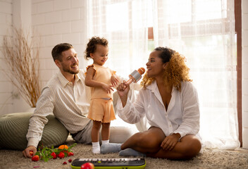 Parents teach children how to walk, hold objects, take turns, play symbolic toys, and express emotions. Love, direction, inspiration, and protection are given. Character and personality development.