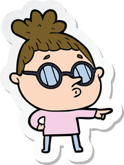 sticker of a cartoon woman wearing glasses