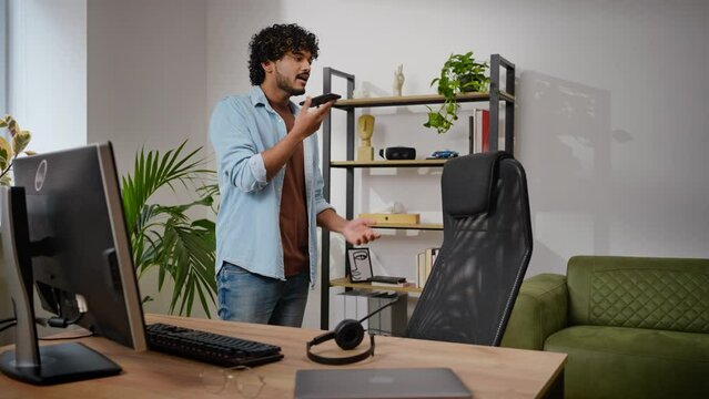Hindus software developer communicates with regular customer
