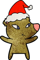 cute hand drawn textured cartoon of a bear wearing santa hat