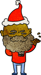 hand drawn textured cartoon of a dismissive man with beard frowning wearing santa hat