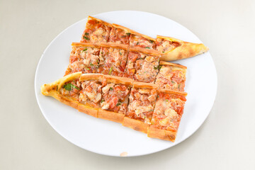 Kiymali pide. Turkish pide with minced meat. Turkish pizza mince pita Pide on white background. Etli ekmek. Kusbasili pide.