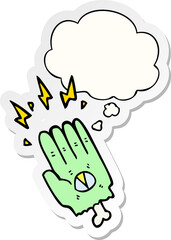 spooky halloween zombie hand with thought bubble as a printed sticker