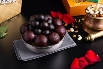 Gulab jamun is a sweet confectionery or dessert, originating in the Indian subcontinent and a type of mithai popular in India, Pakistan, Nepal, the Maldives, and Bangladesh