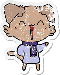 distressed sticker of a happy little cartoon dog in winter clothes