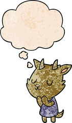 cartoon goat with thought bubble in grunge texture style