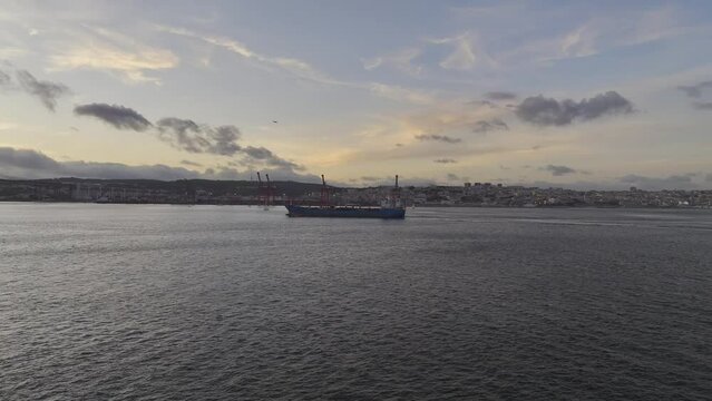 Drone footage of a tanker ship in lisbon.